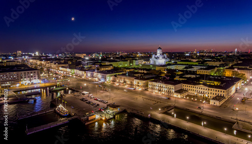 Quiet Helsinki by night. A drone view to the city center, Market Square and Helsinki Cathedral