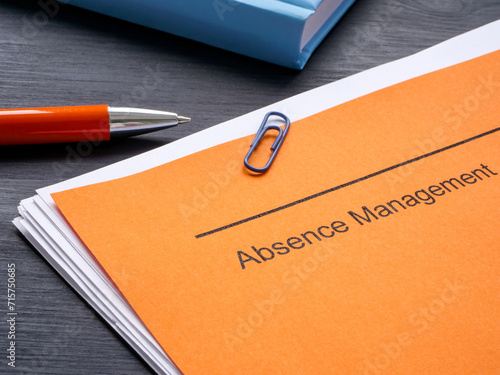 Tableau sur toile Documents about absence management and notepad.