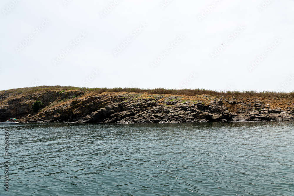 View of the coast of an island from the sea