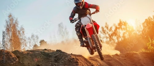 Motocross rider on the race. Extreme motocross. Motocross. Enduro. Extreme sport concept. © John Martin