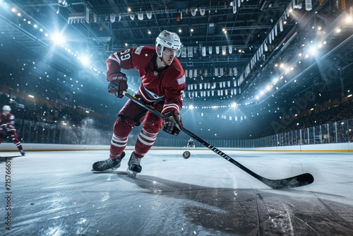 Ice hockey player in action on the rink. The concept of sport, hobby, entertainment.