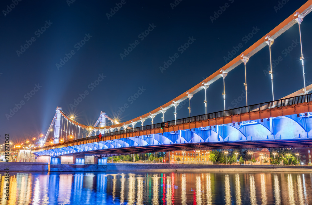 Fototapeta premium Krymsky Bridge or Crimean Bridge in Moscow at summer night