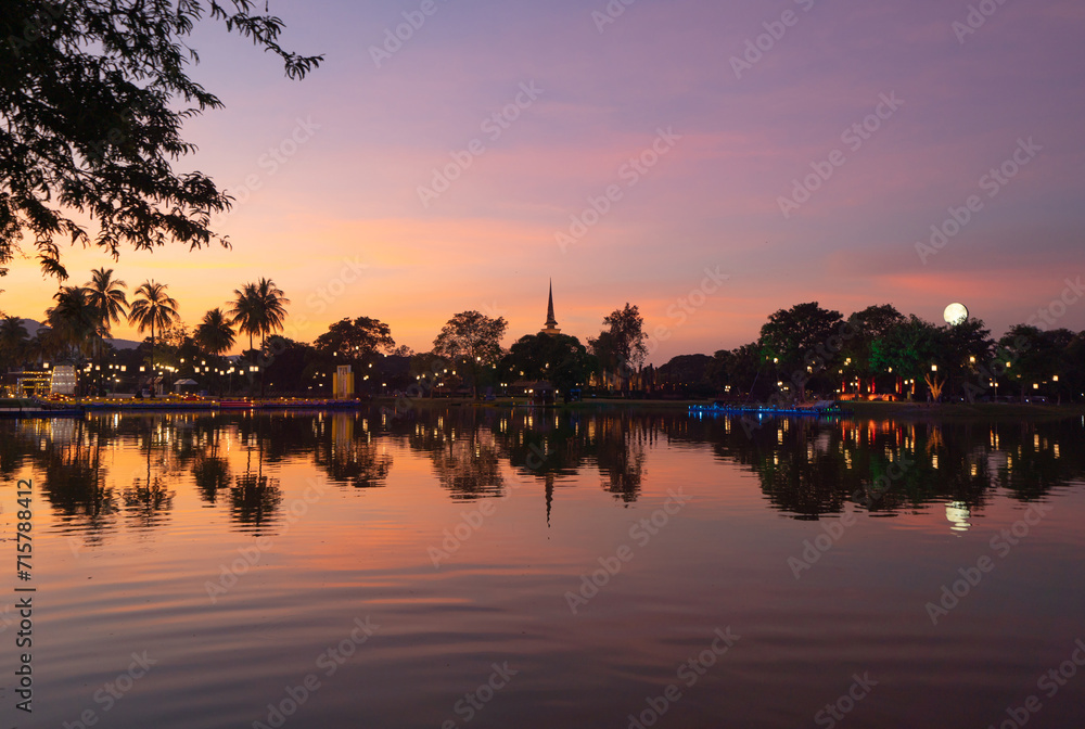 Sukhothai Historical Park festival, buddha pagoda stupa in a temple, Sukhothai, Thailand. Thai buddhist temple architecture at night. Tourist attraction.