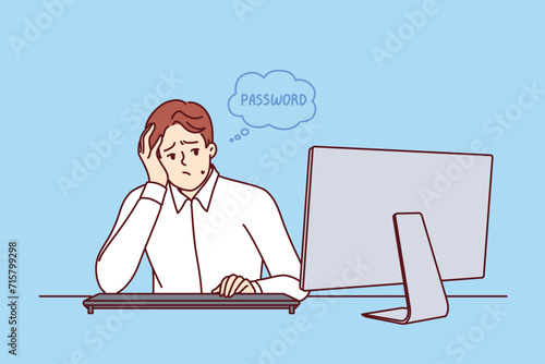 Business man comes up with password that reliably protects personal data or corporate information from hacking, sits at table with computer. Office worker feels embarrassed because forgot password