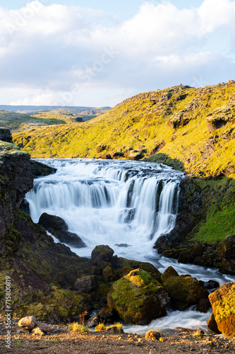 Long exposure view of famous waterfalls of river Sk  g  . Sk  gafoss. Magnificent Iceland in august. Fimmv  r  uh  ls Hiking Trail. Popular Travel destinations. Hestava  sfoss waterfall