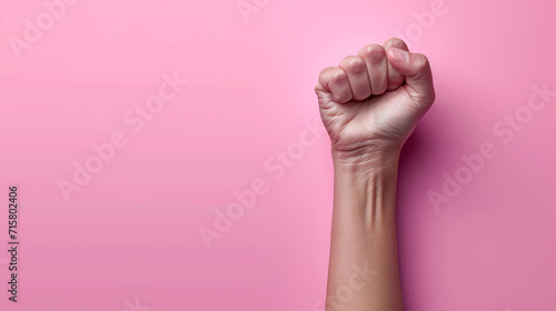 Symbol of Strength and Femininity - Raised Fist - Women's Day 