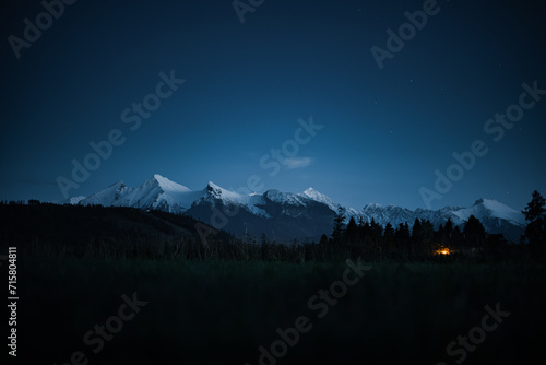 Night picture od mountains cover with snow