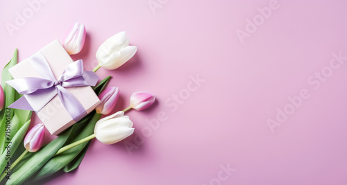Beautiful flowers, pink white tulips, gift with satin ribbon, lilac background. Postcard template, March 8, Nurse's Day