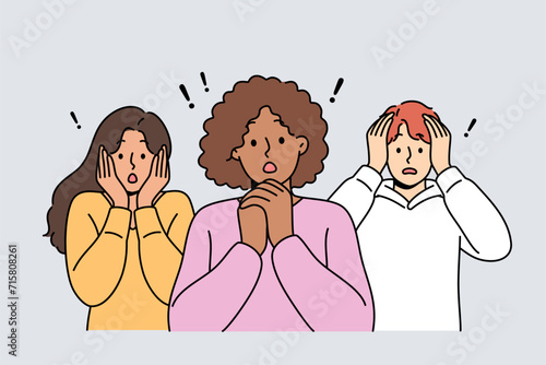 Frightened people feel fear after warnings of approaching storm or financial crisis causing mass layoffs. Multiethnic women and man with frightened grimaces experiencing shock and panic due to phobia