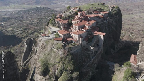 Meteora Kalabaka Greece monastery on the rocks, Aerial drone shot view in 4K. D-log M Flat format ready for grading.,