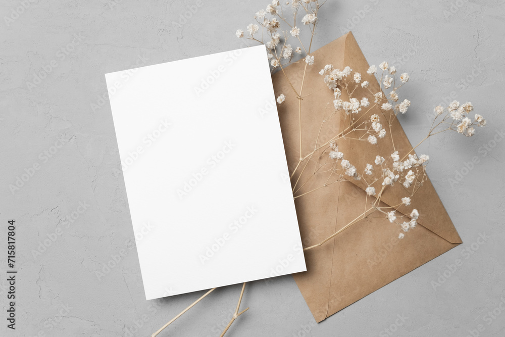 Wedding invitation card mockup with envelope and gepsophola flowers, blank card mock up with copy space Wedding invitation card mockup with envelope and gepsophola flowers, blank card mock up with copy space