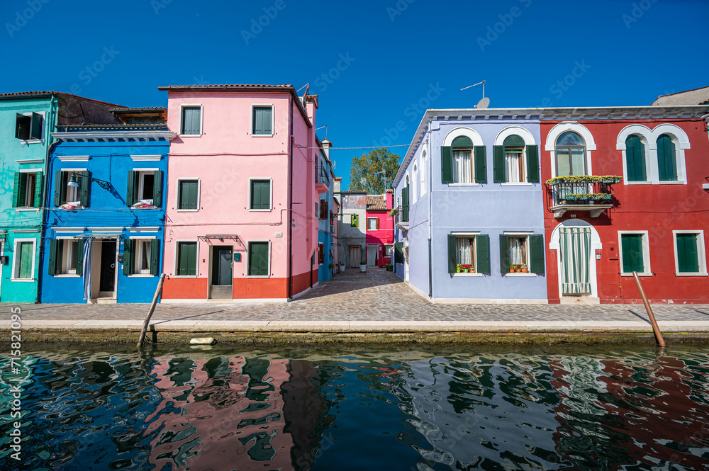 Colorful houses on the canal in Burano island