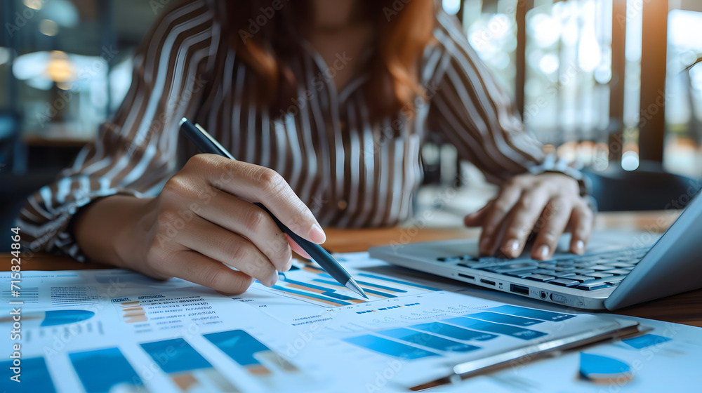Woman analyzing and calculating data for long term investment growth goals and company finance balance Woman analyzing and calculating data for long term investment growth goals and company finance balance