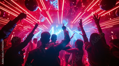 people partying in a nightclub with neon lights
