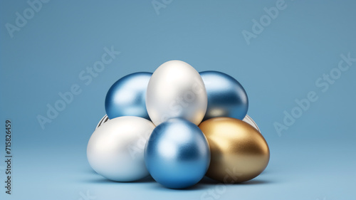  A bunch of golden an silver colored easter eggs on a isolated blue background 