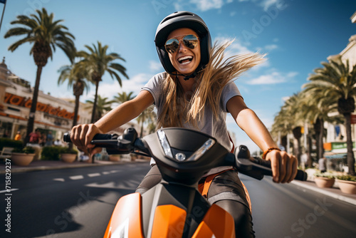 a woman with a smile races on a moped