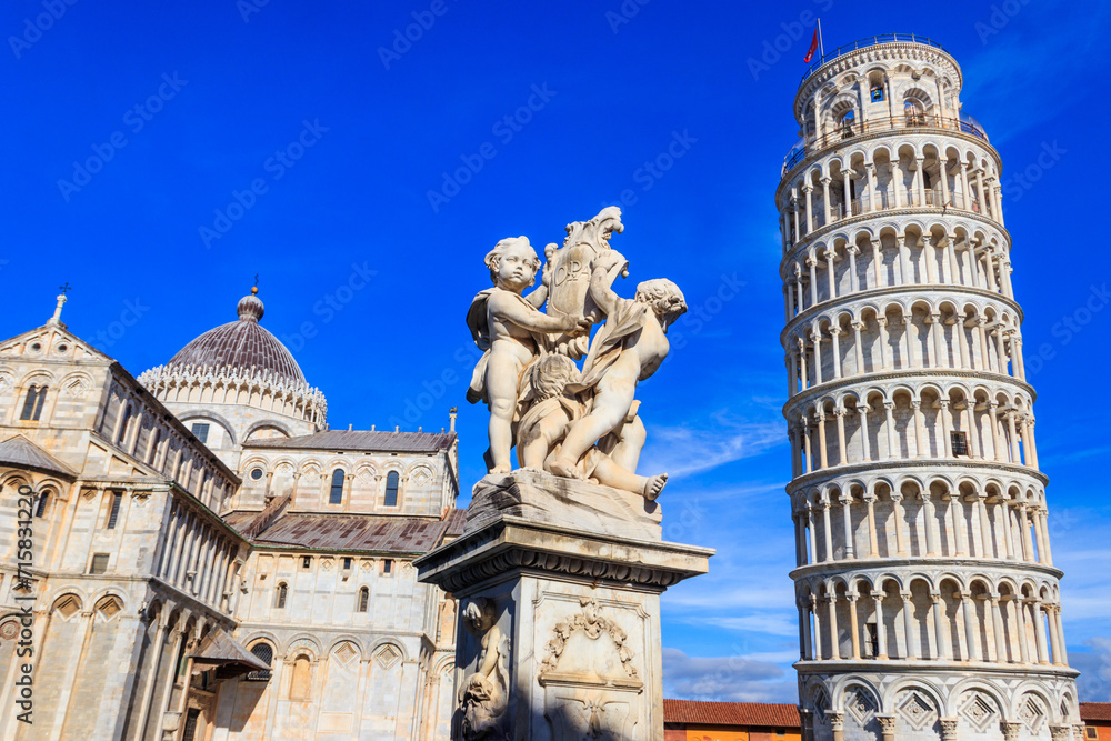 Pisa Cathedral (Cathedral of the Assumption of Mary) , Fountain of Angels and Leaning Tower of Pisa on Piazza dei Miracoli in Pisa, Tuscany, Italy