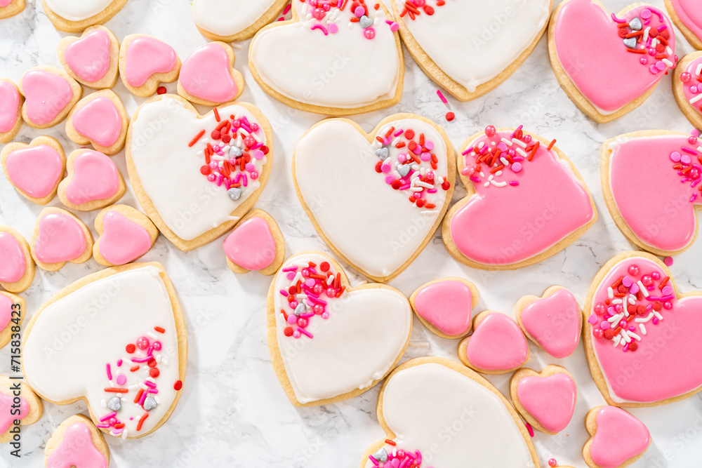Heart-shaped sugar cookies with royal icing - obrazy, fototapety, plakaty 