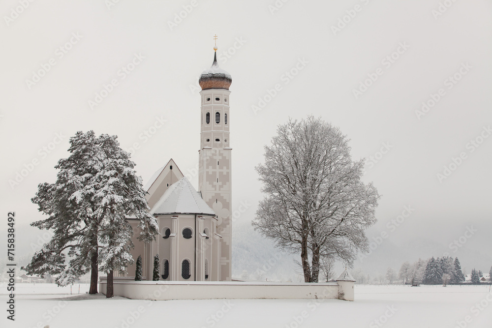 St. Coloman Church in winter landscape