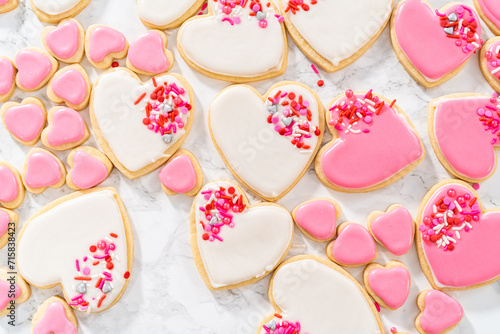 Heart-shaped sugar cookies with royal icing photo