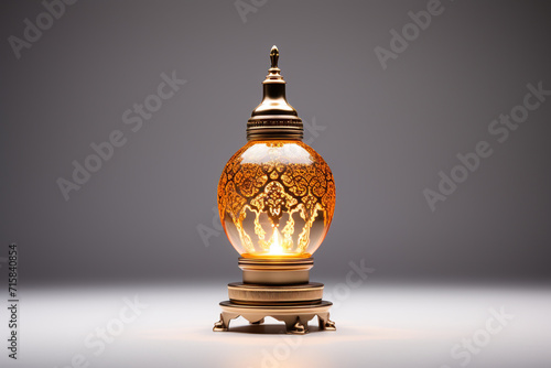 Arabic lantern with burning candle on wooden table against blurred background. Ramadan Kareem concept