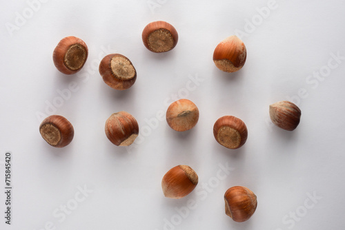 Top view of hazelnuts on white background