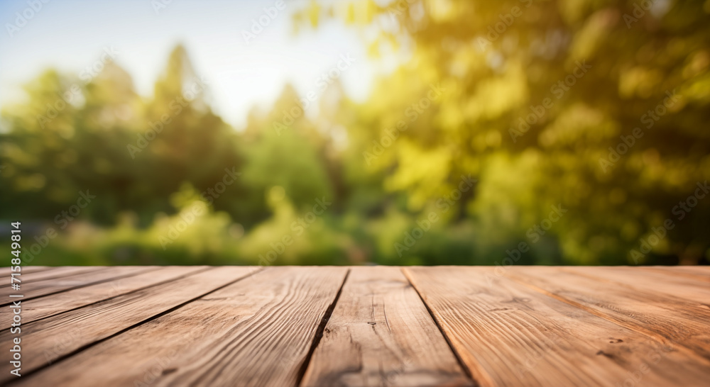 An empty, rustic wooden table overlooks a lush green forest, blurred to create a serene backdrop.