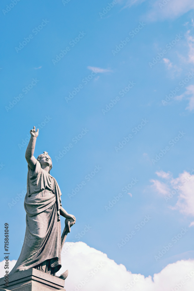 Statue Of a Woman Pointing Skyward, Green-Wood Cemetery, Brooklyn, New York Statue Of a Woman Pointing Skyward, Green-Wood Cemetery, Brooklyn, New York