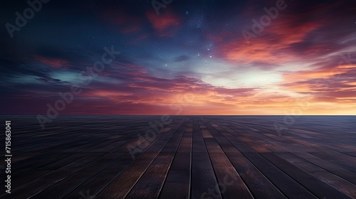 Dark floor background with clouds, lovely sunset and night sky in the distance. © Ilmi