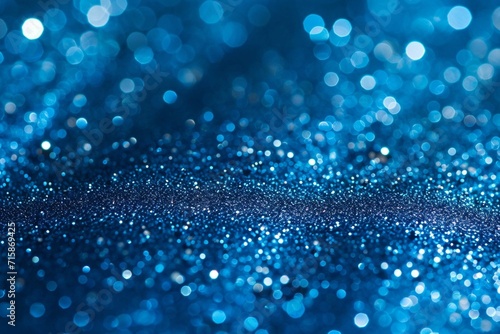 Sapphire glitter bokeh background. Unfocused shimmer royal blue sparkle. Crystal droplets wallpape