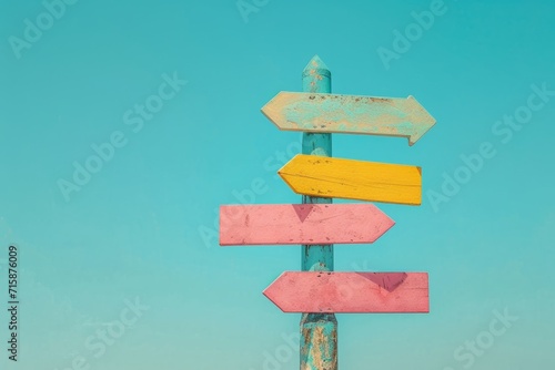 an arrow on a post pointing to different destinations