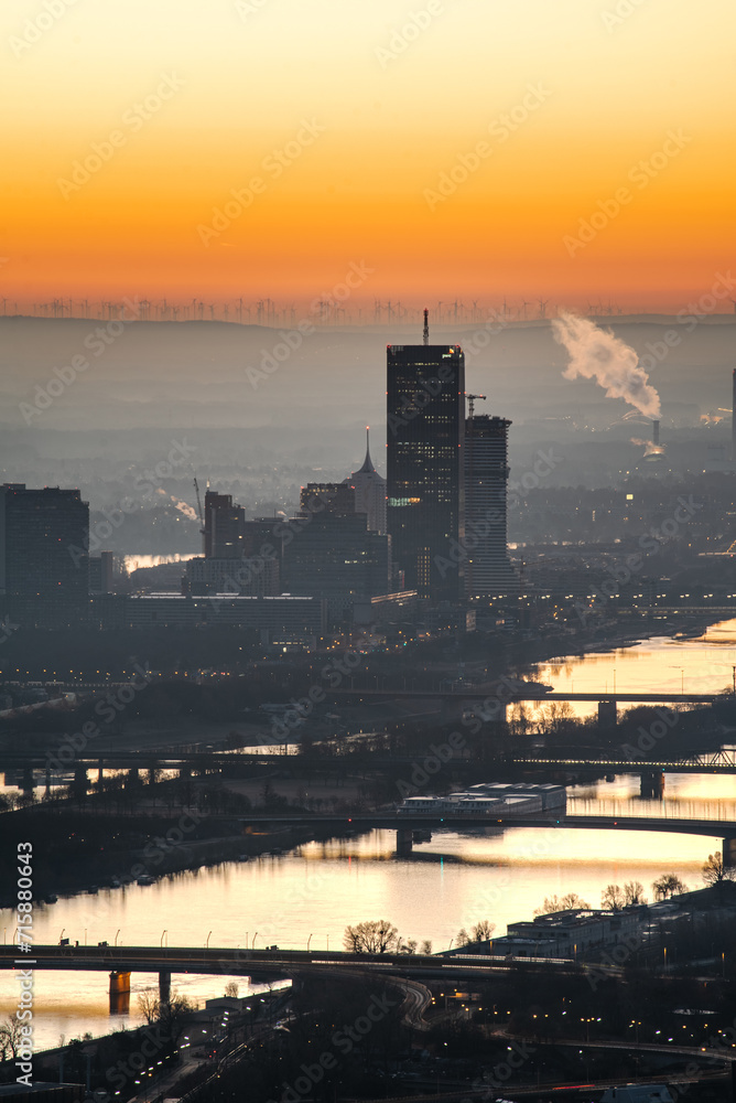 Naklejka premium Left bank of the Danube river in the capital city of Austria, Vienna just before sunrise