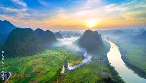 aerial view of dawn on mountain at ngoc con ward trung khanh town cao bang province vietnam with river nature green rice fields near ban gioc waterfall photo