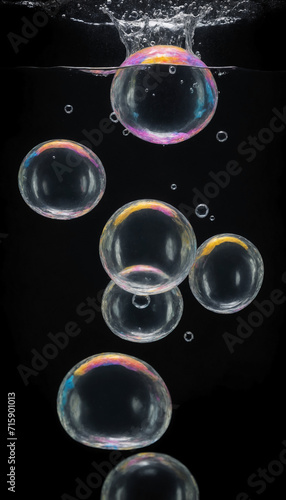 Bubbles floating in the water with dark background