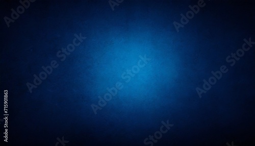 dark blue background texture with black vignette in old vintage textured border design dark elegant teal color wall with light spotlight center