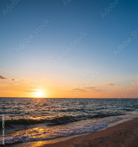 Landscape horizon viewpoint vertical summer sea beach nobody wind wave cool holiday calm coastal sunset sky light orange golden evening day time look calm nature tropical beautiful ocean water travel © Singh