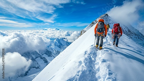 Climbers ascending a snow-covered peak, highlighting the challenge and beauty of high-altitude mountaineering. [Climbers on snow-covered peak photo
