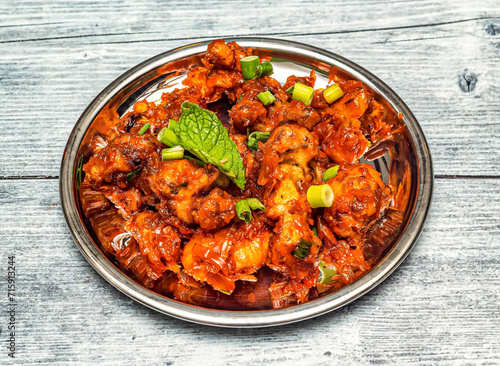 Tablou pe pânză gobi manchurian served in dish isolated on wooden table top view of indian spicy