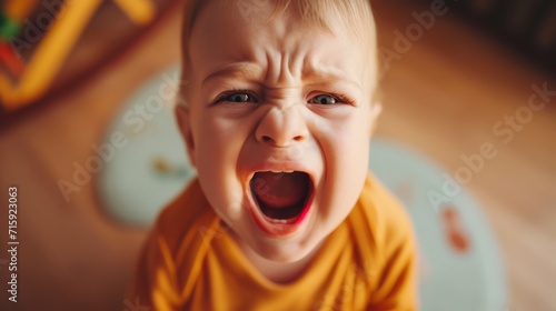 Closeup  of little baby boy crying and screaming photo