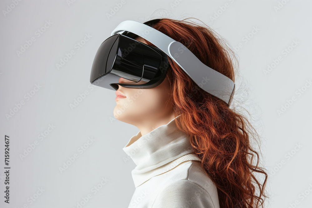 Woman Experiencing Virtual Reality with Modern VR Headset on White Background Woman Experiencing Virtual Reality with Modern VR Headset on White Background