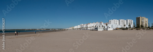 Panorama. Panoramic view of the beautiful Valdelagrana beach, located in El Puerto de Santa María, in the province of Cadiz, autonomous community of Andalusia, Spain photo