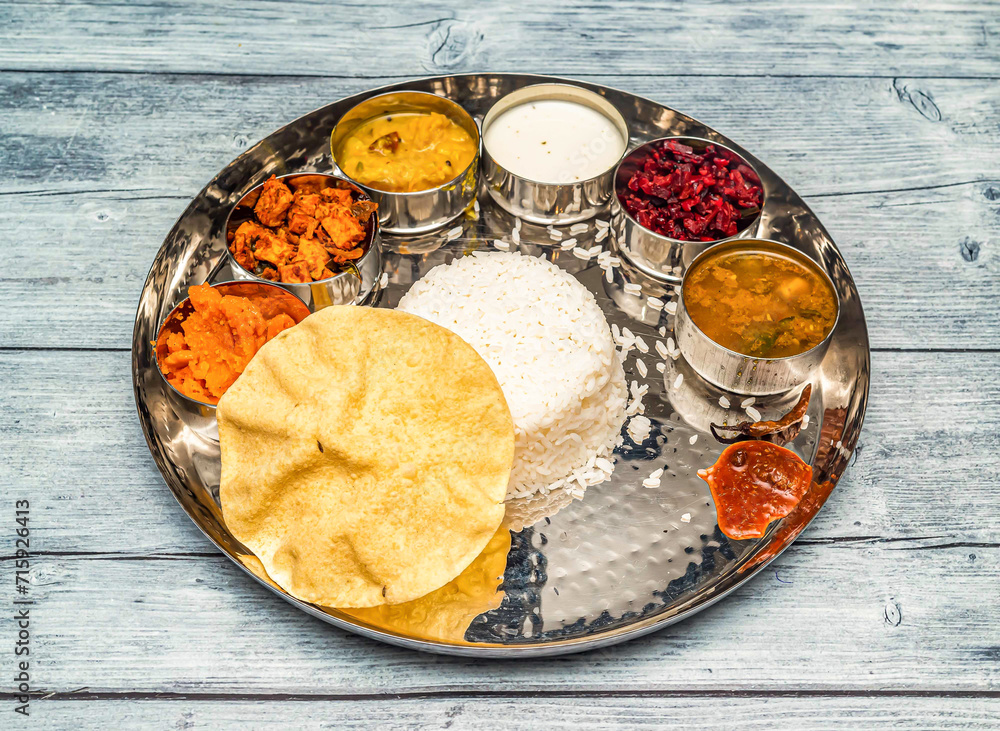 south indian vegetarian meal thali vegetables, curry, rice, raita ...