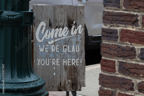 Come in we're glad you're here sign