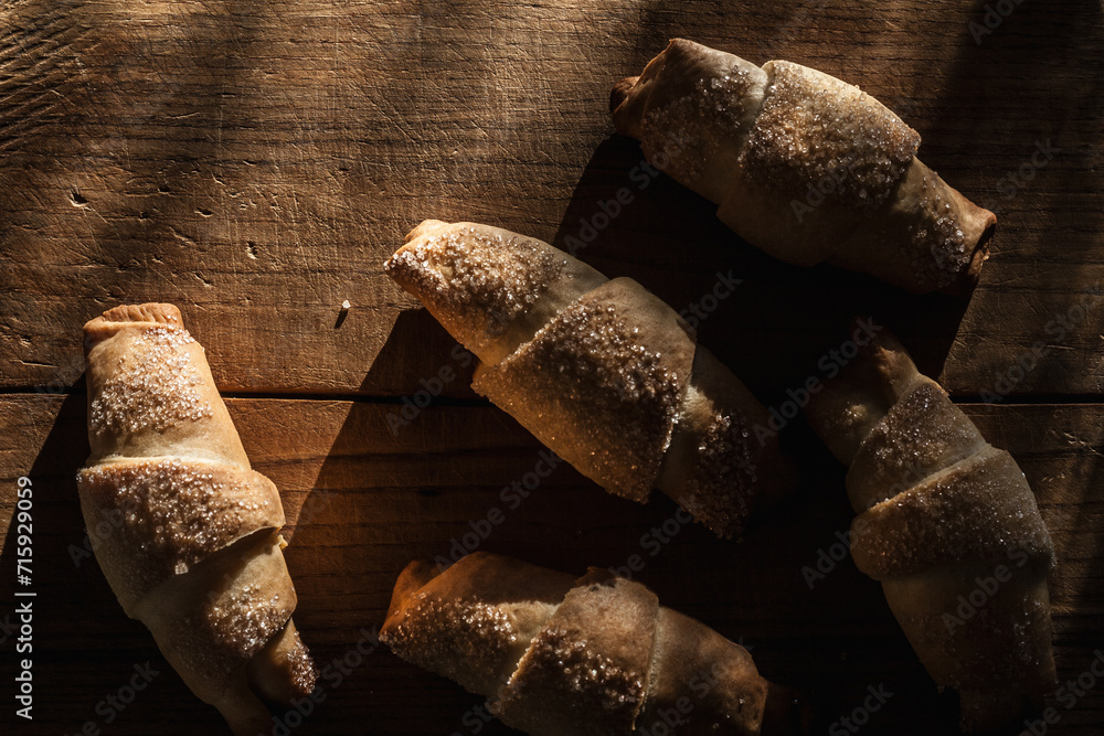 Homemade croissants on wood table Homemade croissants on wood table