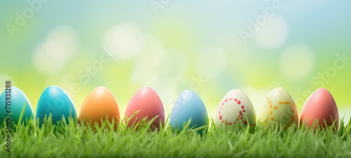 Colorful Decorated Easter Eggs on Fresh Spring Grass