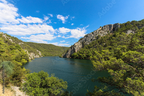 Nature's Symphony: Krka National Park, Croatia - Seaside Rocks and Hillside Views
