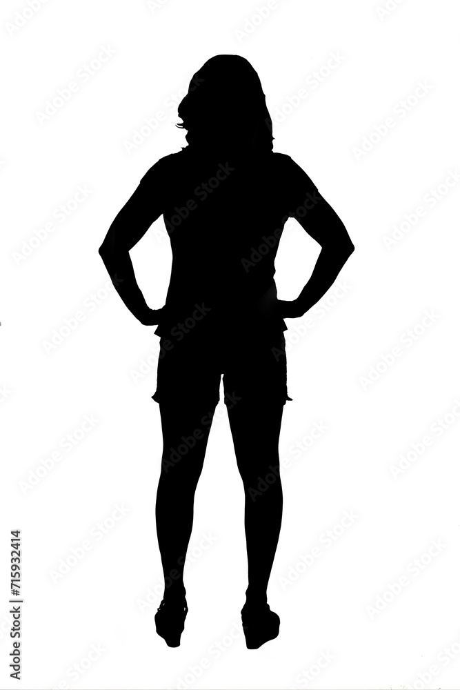 back view of a black and white silhouette of a woman wearing espadrilles and shorts