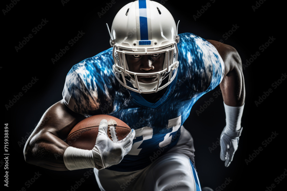 Strength, speed. Portrait of a young American football player, an athlete in a white and blue sports uniform, running on a black background. 