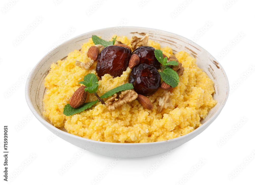 Tasty cornmeal with dates, nuts and mint in bowl isolated on white Tasty cornmeal with dates, nuts and mint in bowl isolated on white