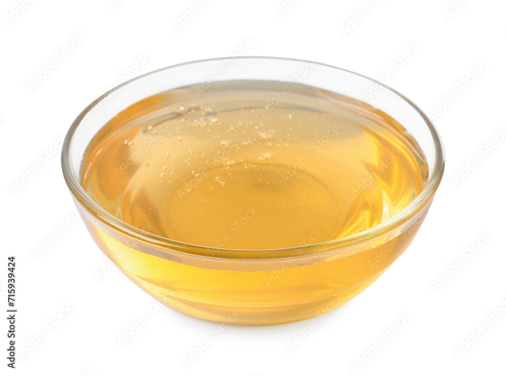 Tasty honey in bowl isolated on white Tasty honey in bowl isolated on white